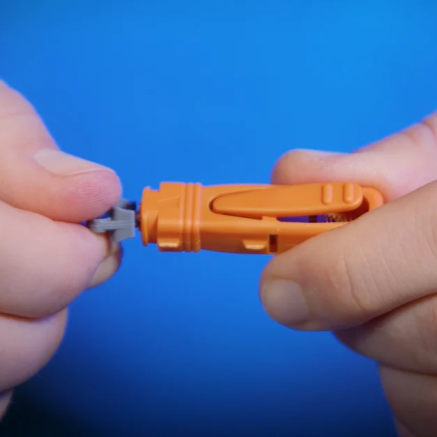 Patris Health Thyroid Function Home Test – step 1, twisting the grey protective cap off the lancet
